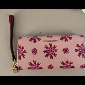 Michael Kors Wristlet- travel continental